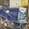 The photo shows a package with clothing in the category BB.