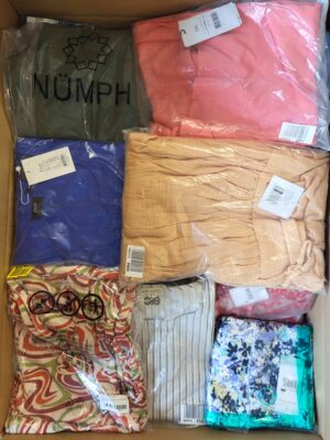 The photo shows a package with clothing in the category AR.