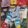 The photo shows a package with clothing in the category H.