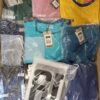 The photo shows a package with clothing in the category H.
