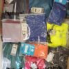 The photo shows a package with clothing in the category H.