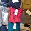 The photo shows a package with clothing in the category U.