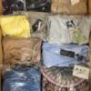 The photo shows a package with clothing in the category B.