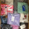 The photo shows a package with clothing in the category B.
