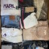 The photo shows a package with clothing in the category B.