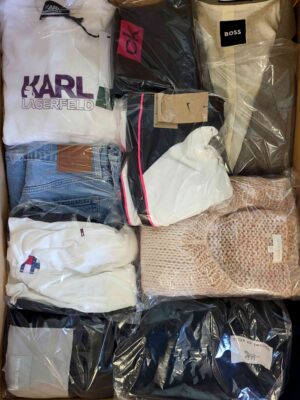 The photo shows a package with clothing in the category B.