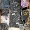 The photo shows a package with clothing in the category D.