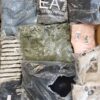 The photo shows a package with clothing in the category D.