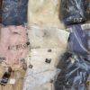 The photo shows a package with clothing in the category D.