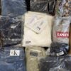 The photo shows a package with clothing in the category D.