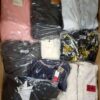 The photo shows a package with clothing in the category C.