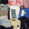 The photo shows a package with clothing in the category T.