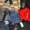 The photo shows a package with clothing in the category T.