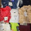 The photo shows a package with clothing in the category T.