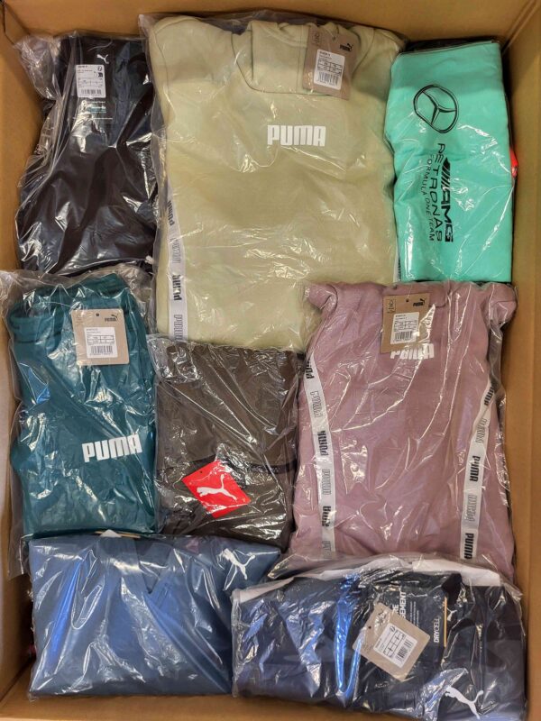 The photo shows a package with clothing in the category AP.