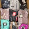The photo shows a package with clothing in the category AP.