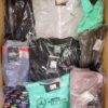 The photo shows a package with clothing in the category AP.