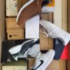 The photo shows a package with footwear in the category BS.