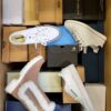 The photo shows a package with footwear in the category BS.