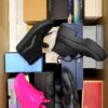 The photo shows a package with footwear in the category BS.