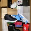 The photo shows a package with footwear in the category BS.