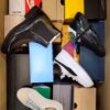 The photo shows a package with footwear in the category BS.