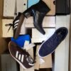 The photo shows a package with footwear in the category BS.