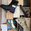 The photo shows a package with footwear in the category BS.