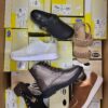 The photo shows a package with footwear in the category SM.