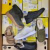 The photo shows a package with footwear in the category SM.