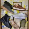 The photo shows a package with footwear in the category SM.