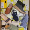 The photo shows a package with footwear in the category SM.