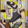 The photo shows a package with footwear in the category SM.
