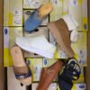 The photo shows a package with footwear in the category SM.