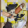 The photo shows a package with footwear in the category SM.
