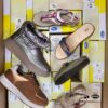 The photo shows a package with footwear in the category SM.