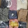 The photo shows a package with clothing in the category BB.