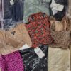The photo shows a package with clothing in the category BB.