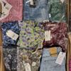The photo shows a package with clothing in the category BB.