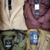 The photo shows a package with clothing in the category TJ.