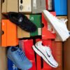 The photo shows a package with footwear in the category CS.