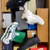 The photo shows a package with footwear in the category CS.