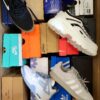 The photo shows a package with footwear in the category CS.