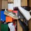 The photo shows a package with footwear in the category CS.