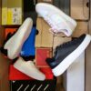 The photo shows a package with footwear in the category CS.