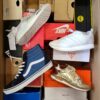 The photo shows a package with footwear in the category CS.