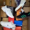The photo shows a package with footwear in the category CS.