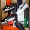 The photo shows a package with footwear in the category CS.