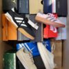 The photo shows a package with footwear in the category CS.