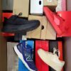 The photo shows a package with footwear in the category CS.
